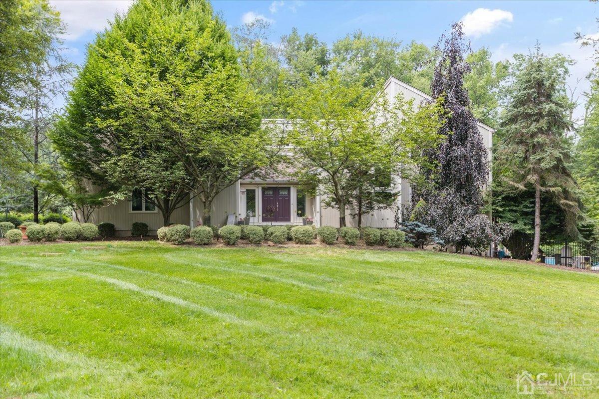 18 Lance Road Lebanon, NJ 08833 - Photo 5 of 45 a view of a house with a big yard and large trees