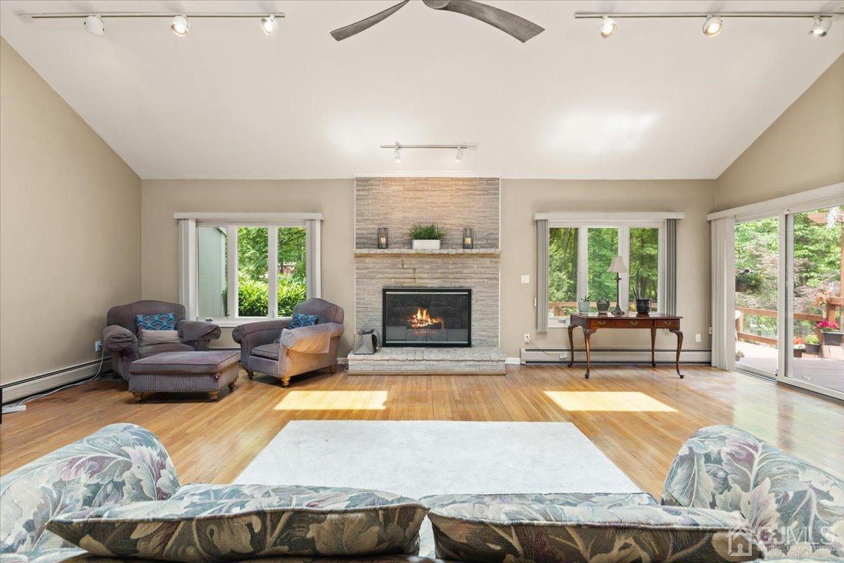 18 Lance Road Lebanon, NJ 08833 - Photo 9 of 45 a living room with furniture and a fireplace