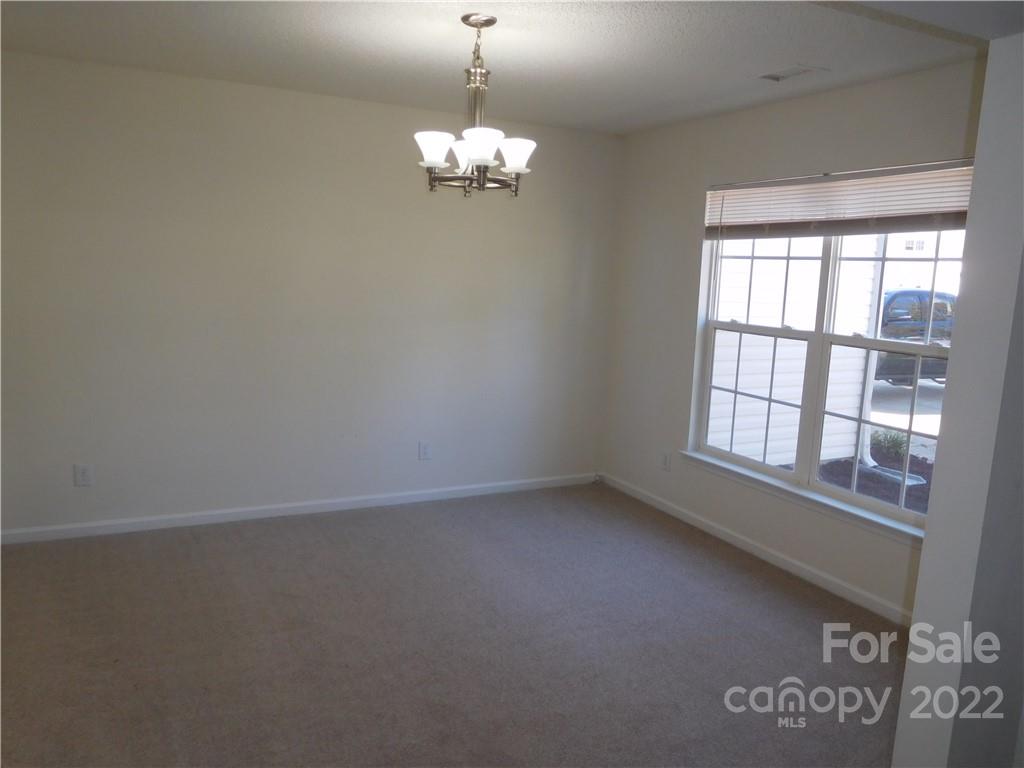8232 Fox Swamp Road Charlotte, NC 28215 - Photo 3 of 19 a view of empty room with window