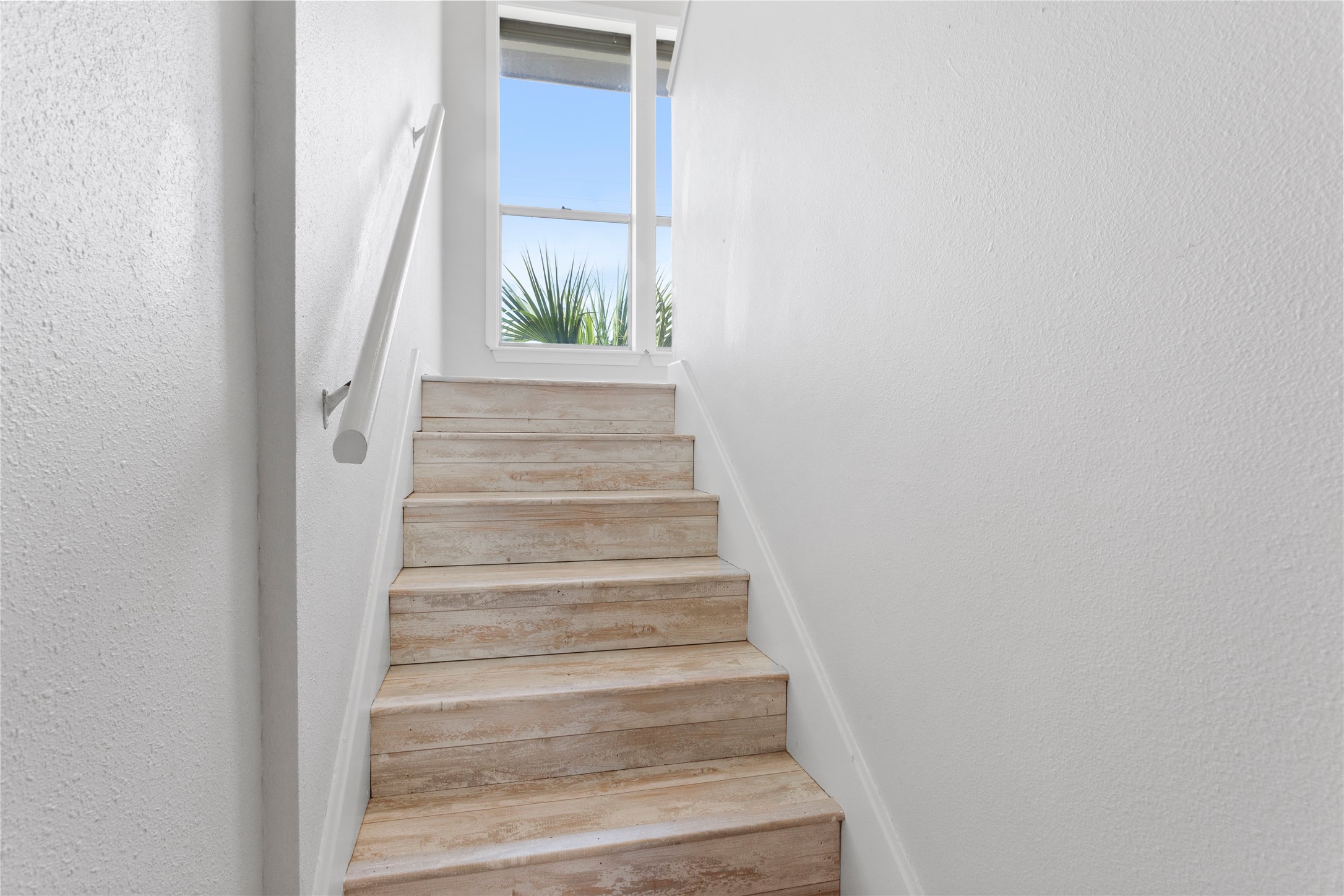 17627 Termini-San Luis Pass Road Galveston, TX 77554 - Photo 19 of 28 Stairway leading up to the top floor. Bay view from the window!