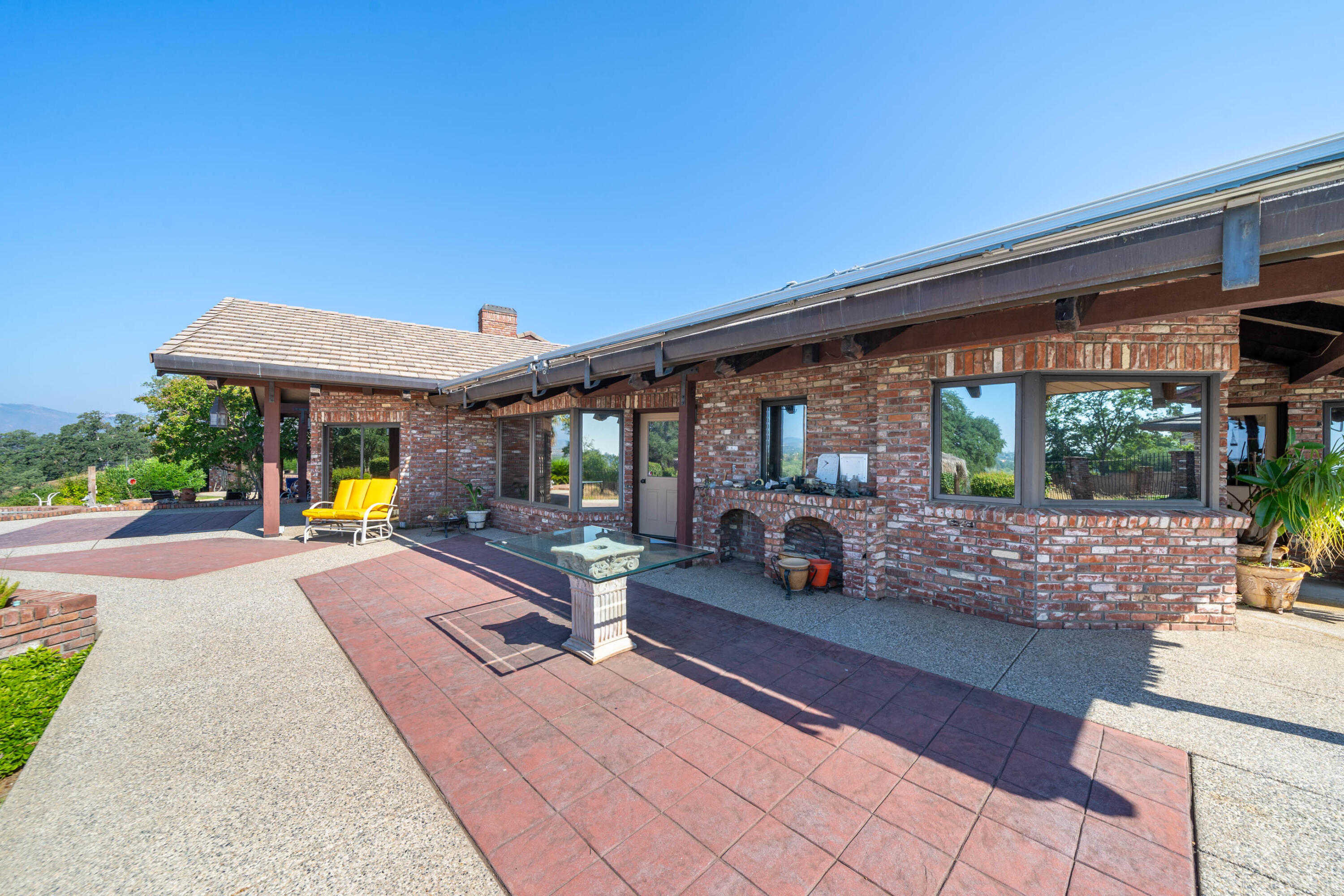 910 River Bend Road Redding, CA 96003 - Photo 34 of 92 a view of outdoor space yard deck patio and swimming pool