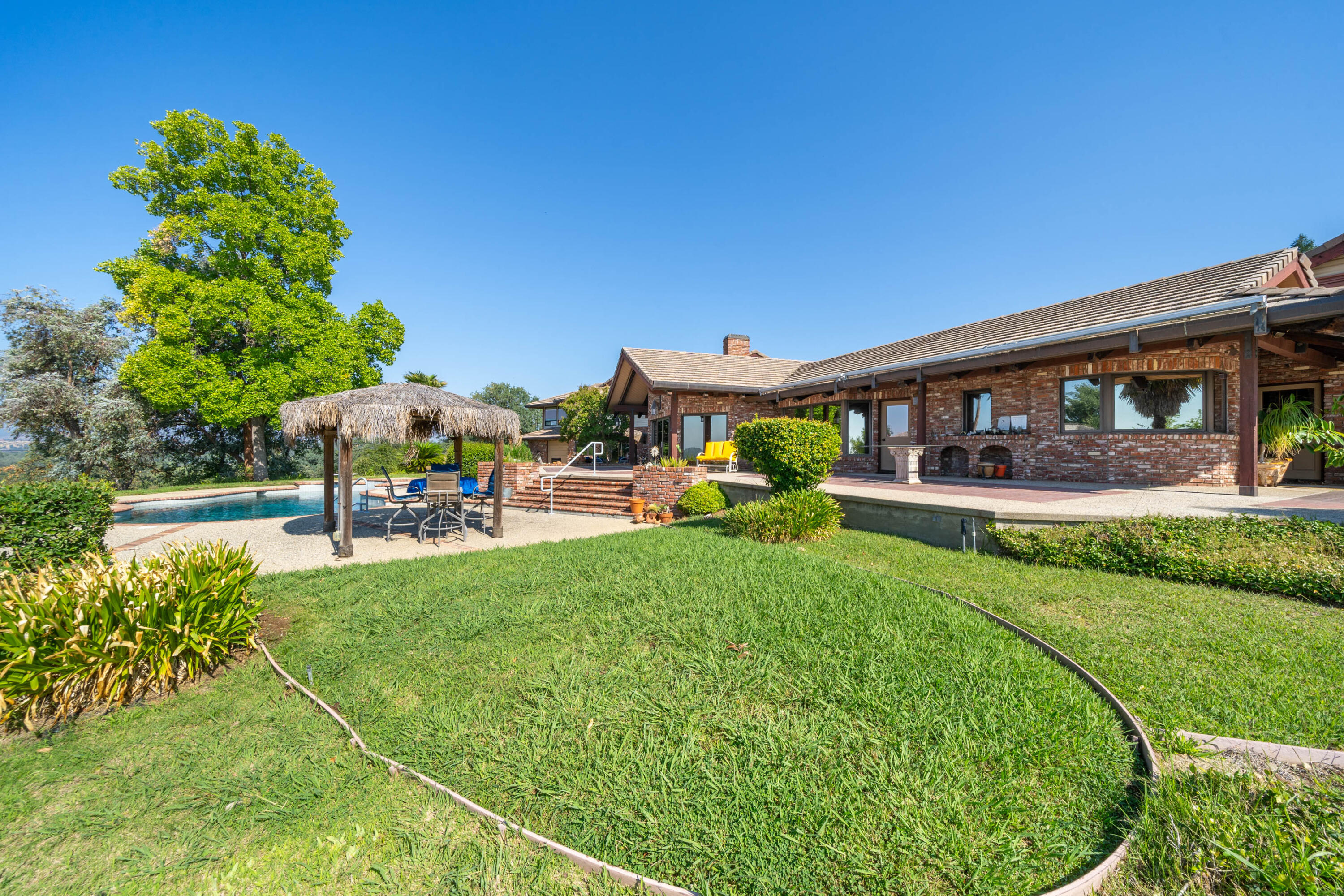 910 River Bend Road Redding, CA 96003 - Photo 36 of 92 a view of a garden