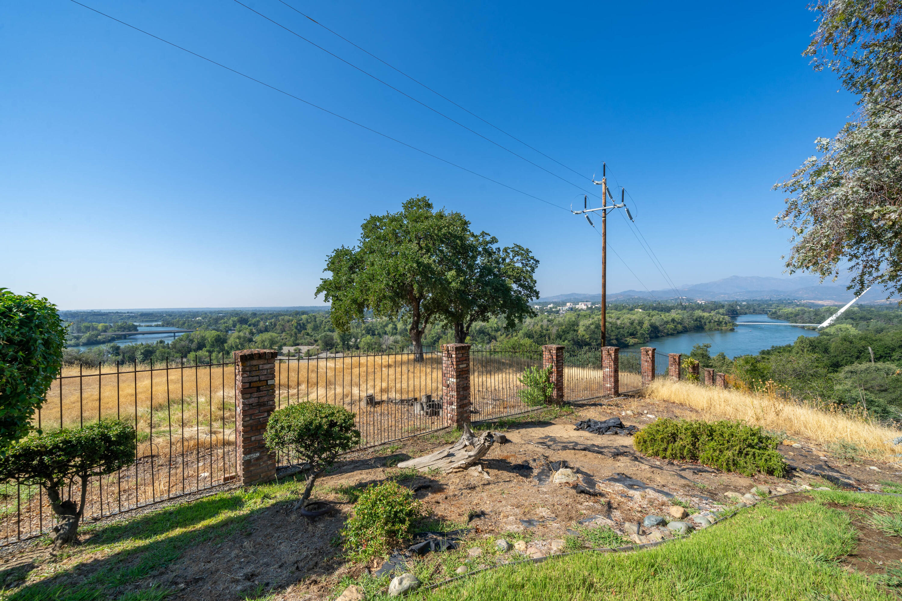 910 River Bend Road Redding, CA 96003 - Photo 37 of 92 a view of a lake with a big yard