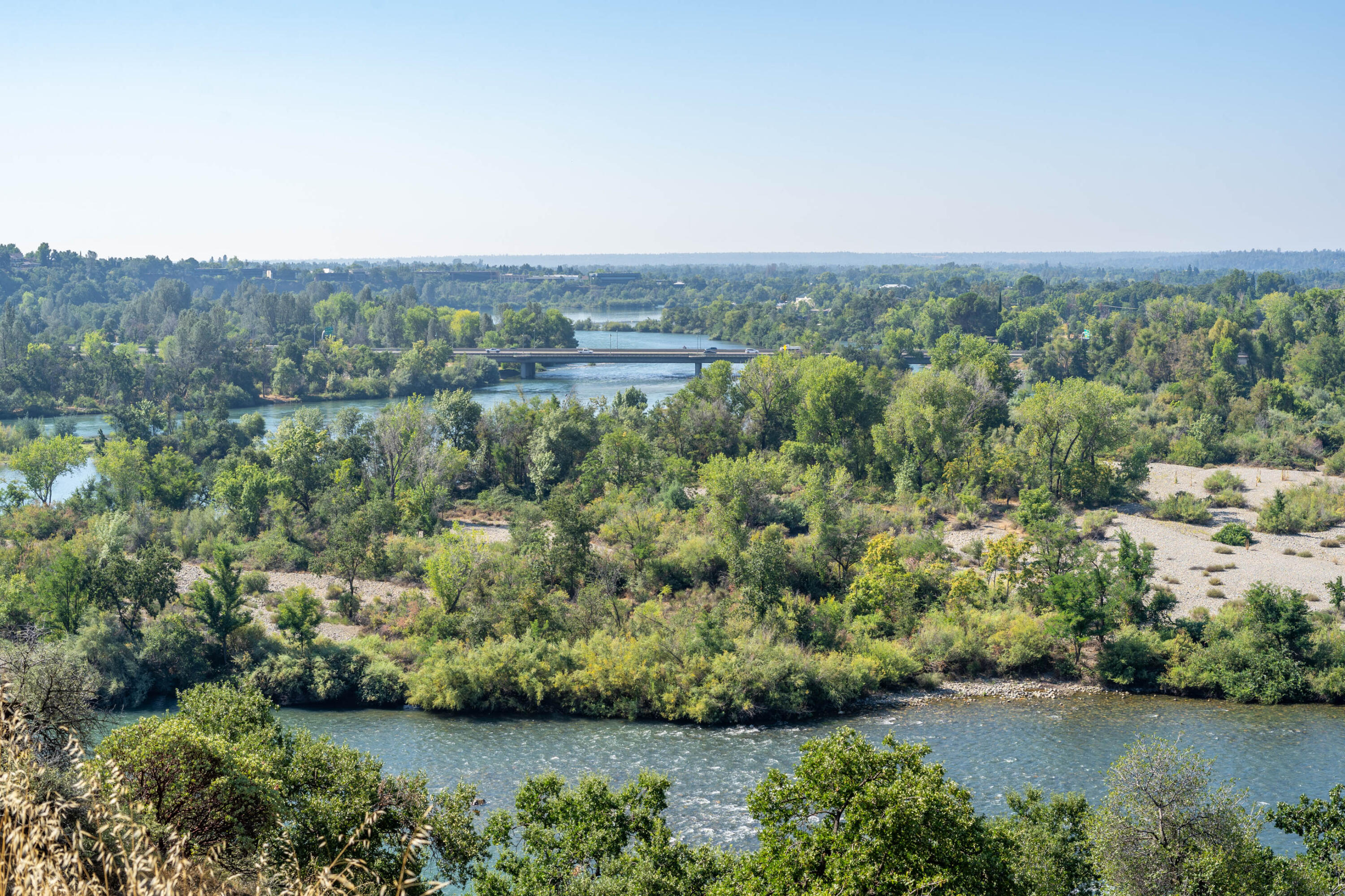 910 River Bend Road Redding, CA 96003 - Photo 41 of 92 an aerial view of a house with a yard