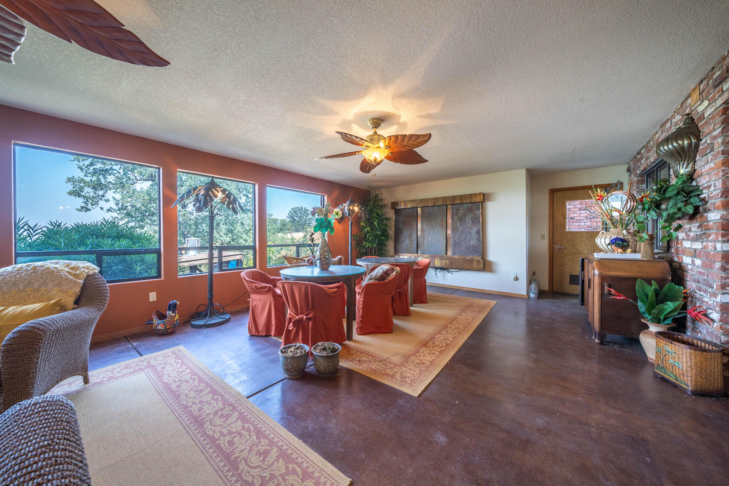910 River Bend Road Redding, CA 96003 - Photo 58 of 92 a living room with furniture and a large window