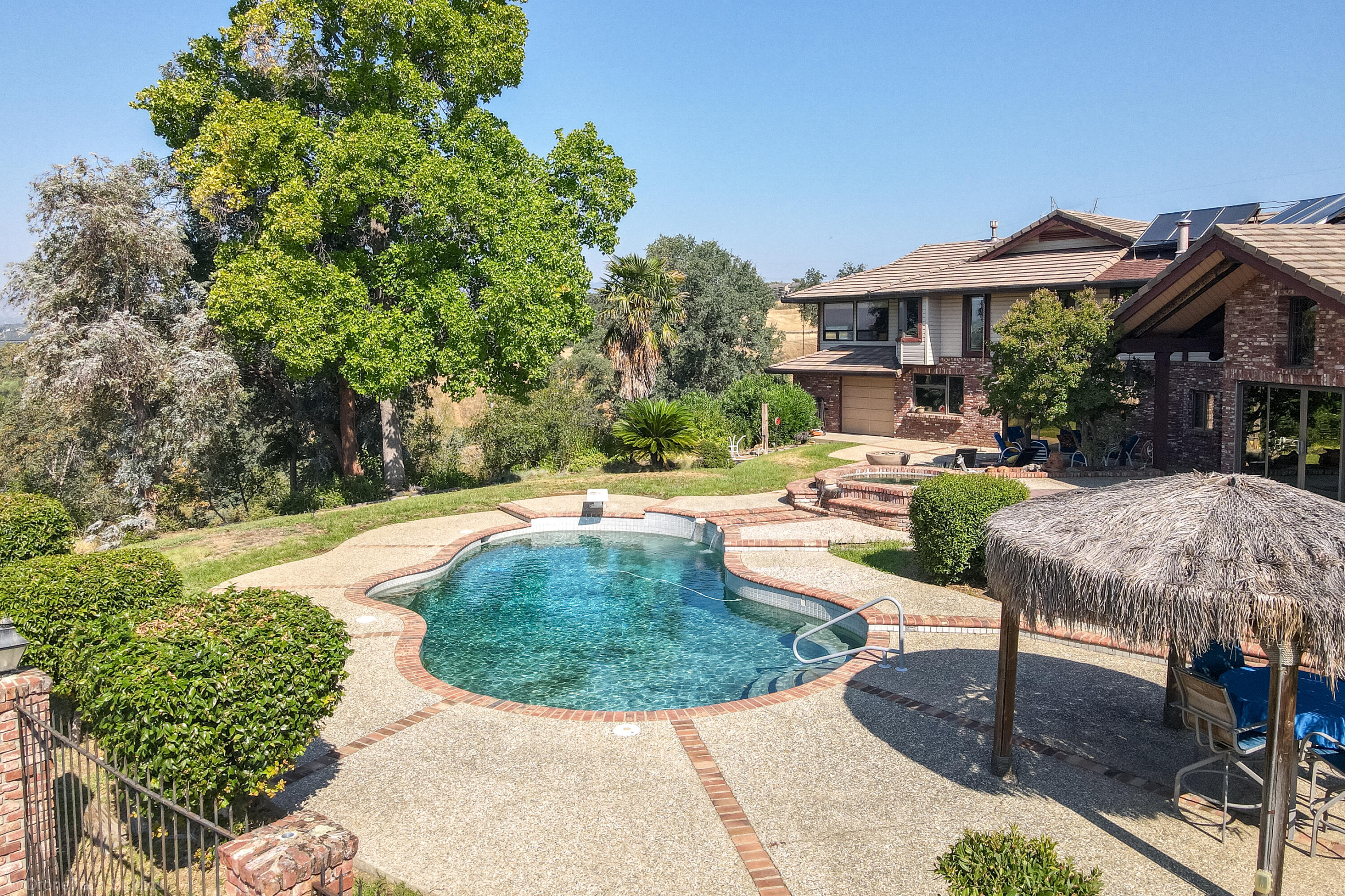 910 River Bend Road Redding, CA 96003 - Photo 6 of 92 a view of a house with entertaining space