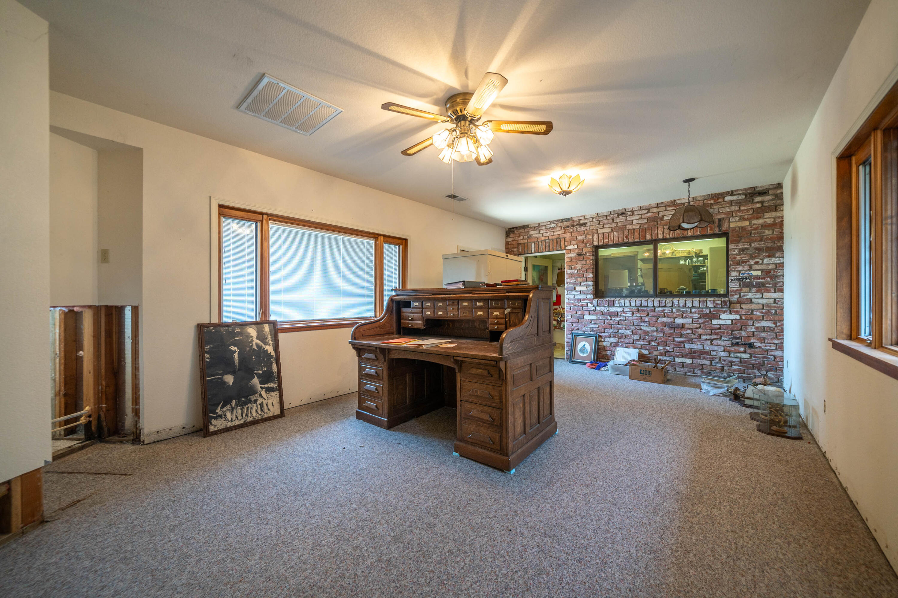 910 River Bend Road Redding, CA 96003 - Photo 87 of 92 a living room with furniture and a flat screen tv