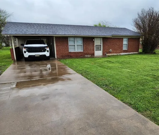 a front view of house with yard