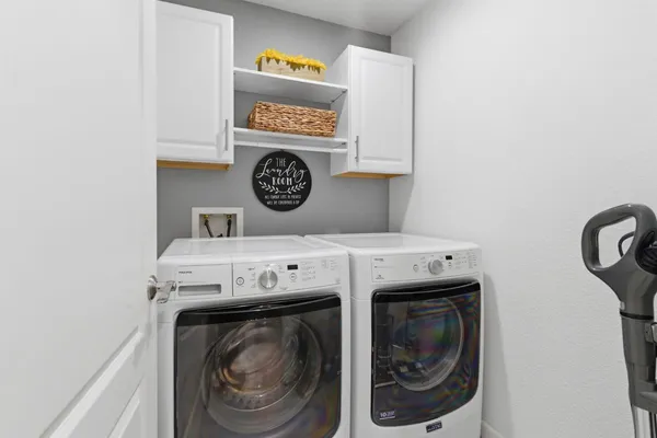a utility room with dryer and washer