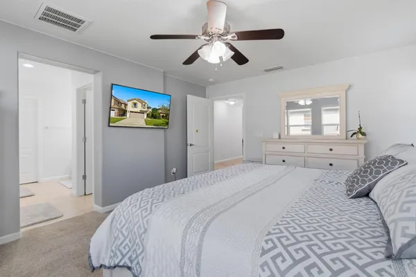 a bathroom with a sink vanity and a mirror