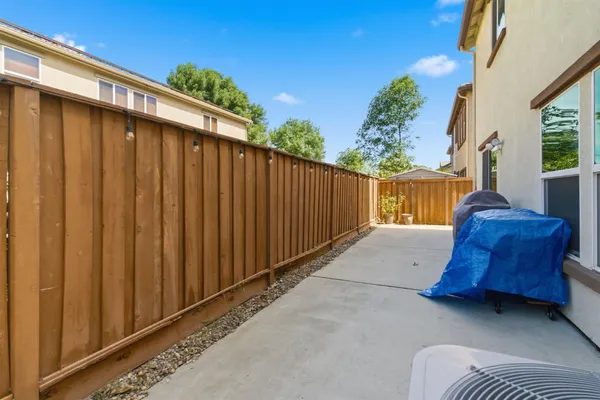 a view of a livingroom with furniture and front door