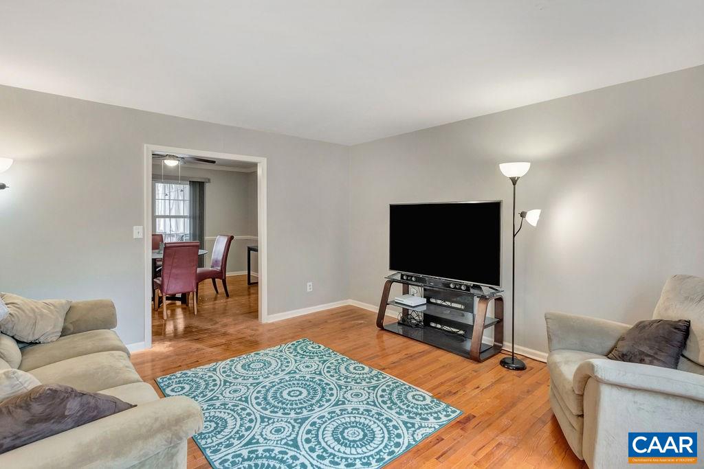 38 Amethyst Road Palmyra, VA 22963 - Photo 15 of 45 a living room with furniture and a flat screen tv
