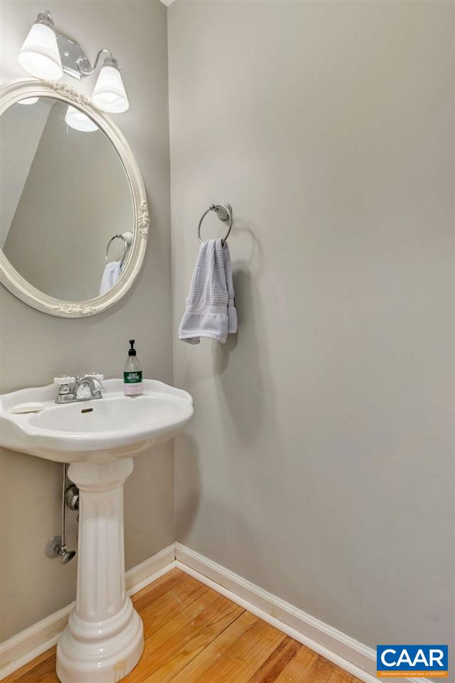 38 Amethyst Road Palmyra, VA 22963 - Photo 16 of 45 a bathroom with a sink and mirror