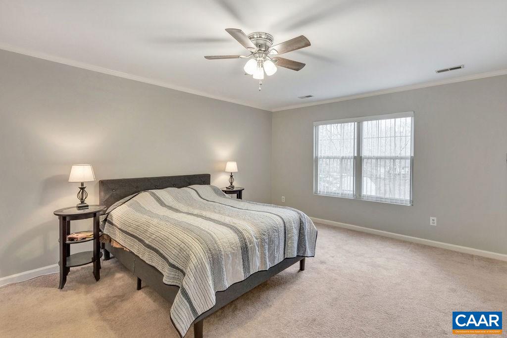 38 Amethyst Road Palmyra, VA 22963 - Photo 17 of 45 a bedroom with a bed and window