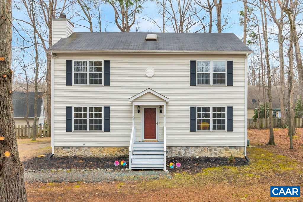 38 Amethyst Road Palmyra, VA 22963 - Photo 2 of 45 a front view of a house with a garage