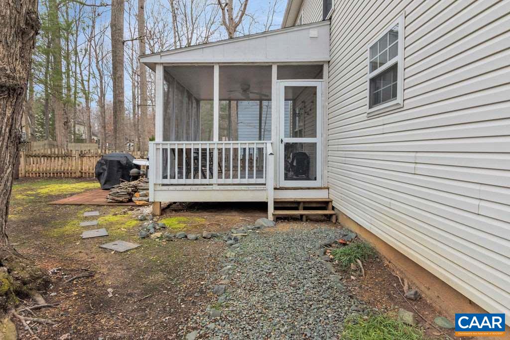 38 Amethyst Road Palmyra, VA 22963 - Photo 27 of 45 a view of a house with backyard and a chair
