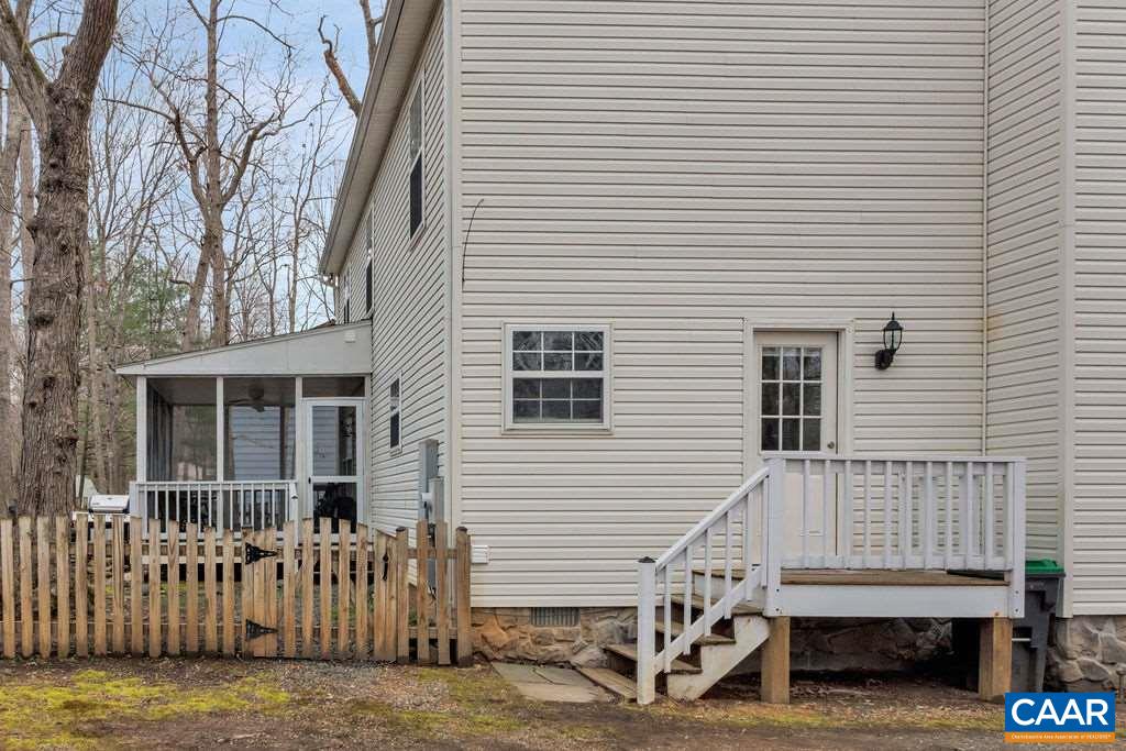 38 Amethyst Road Palmyra, VA 22963 - Photo 29 of 45 a view of a house with a small yard and large tree