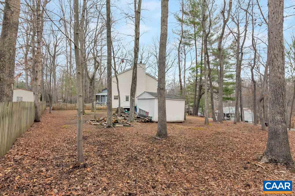 38 Amethyst Road Palmyra, VA 22963 - Photo 32 of 45 a backyard of a house with lots of green space