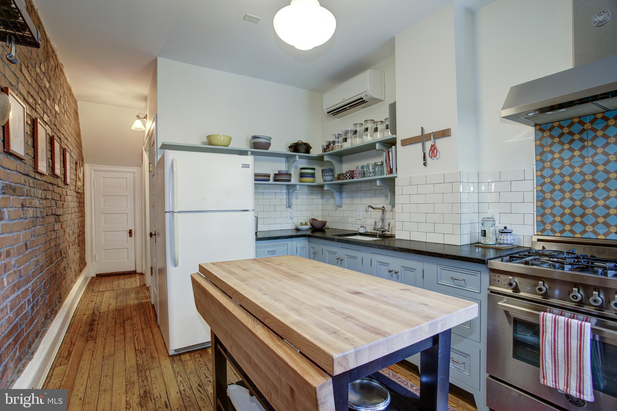 1511 D Street Southeast Washington, DC 20003 - Photo 12 of 29 hand-painted tiles, soapstone counters - stunning