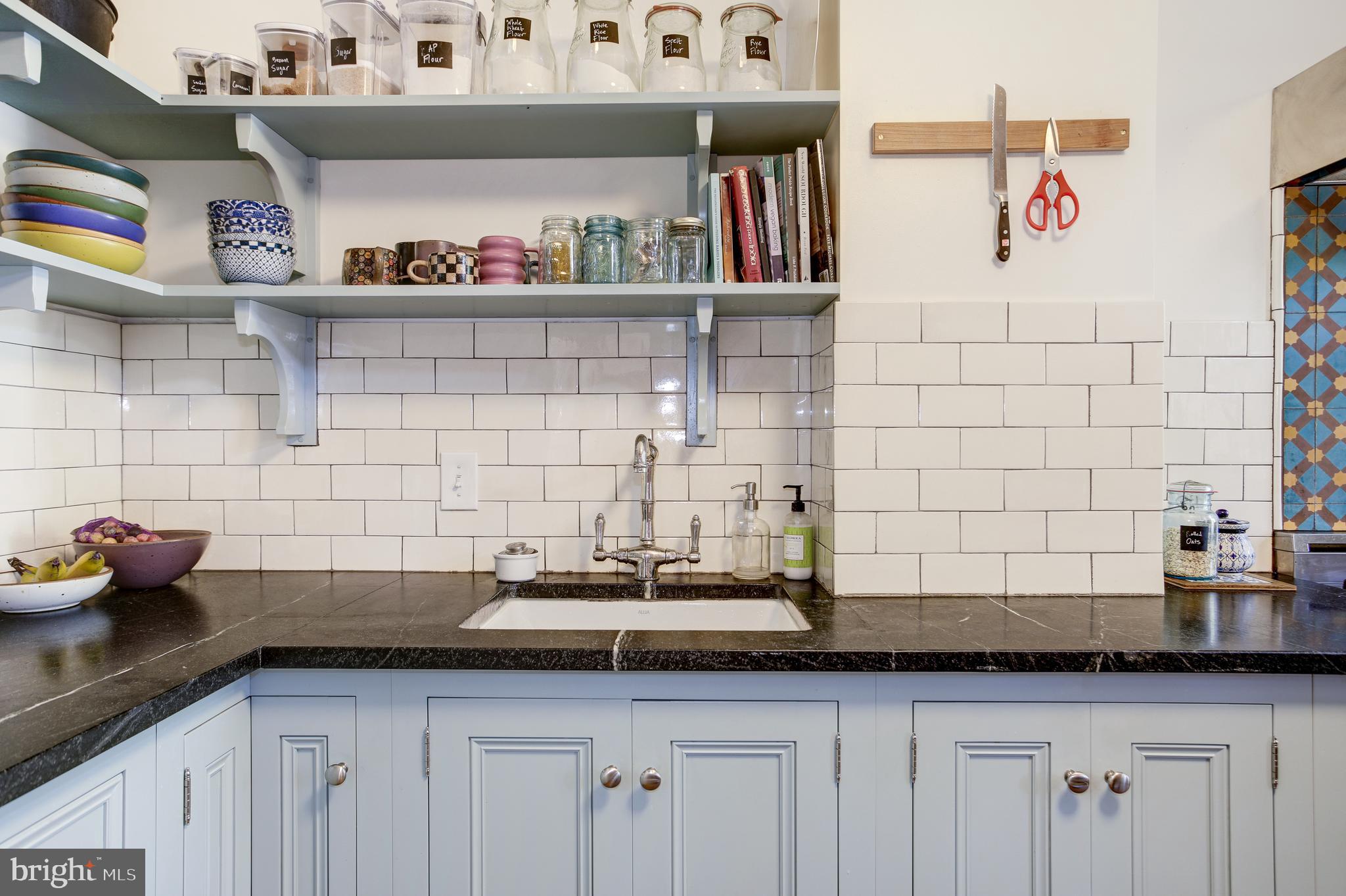 1511 D Street Southeast Washington, DC 20003 - Photo 15 of 29 Beautiful heavy brass fixtures and inset cabinets