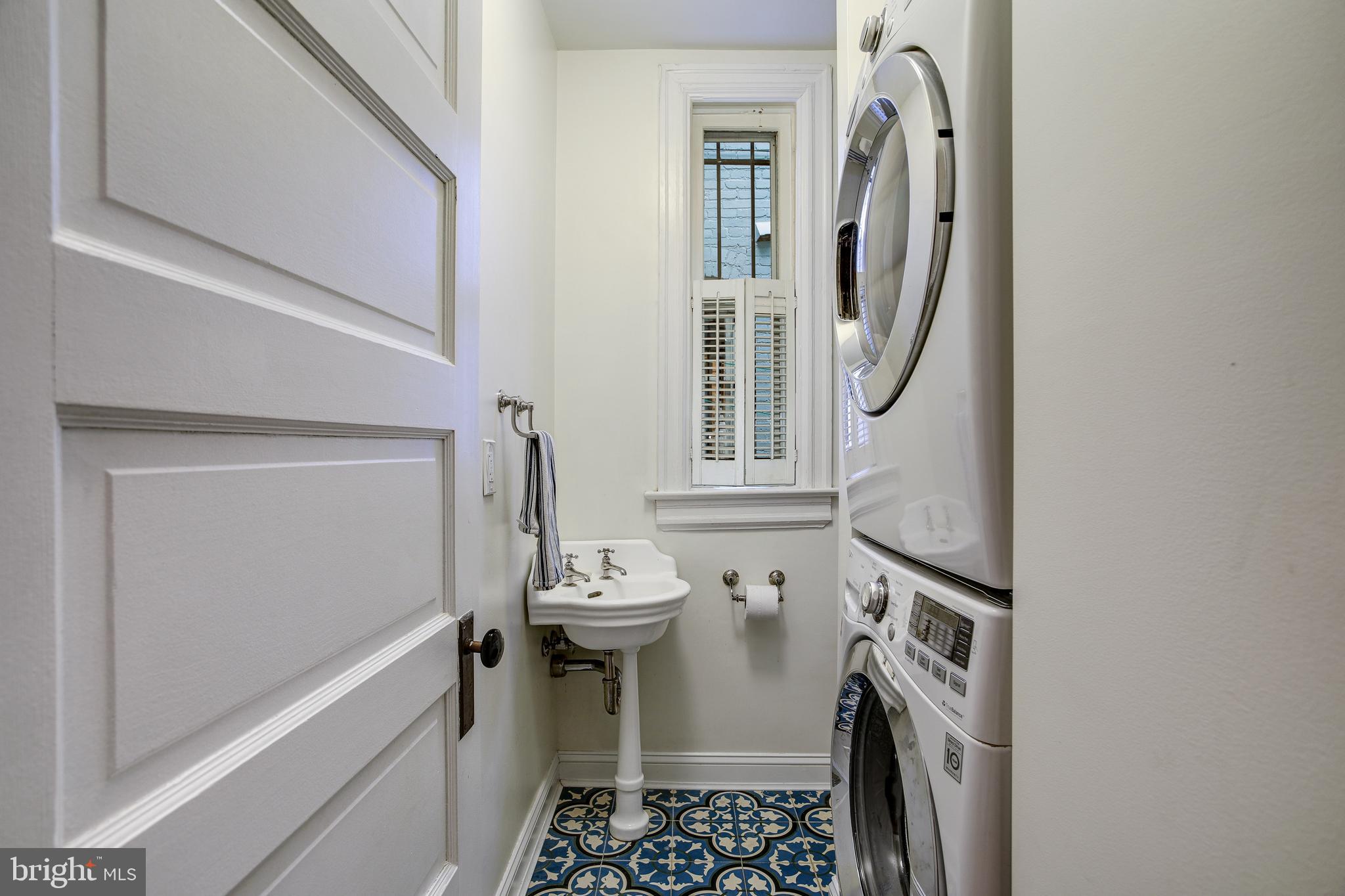 1511 D Street Southeast Washington, DC 20003 - Photo 17 of 29 Tucked 1/2 bath on main level