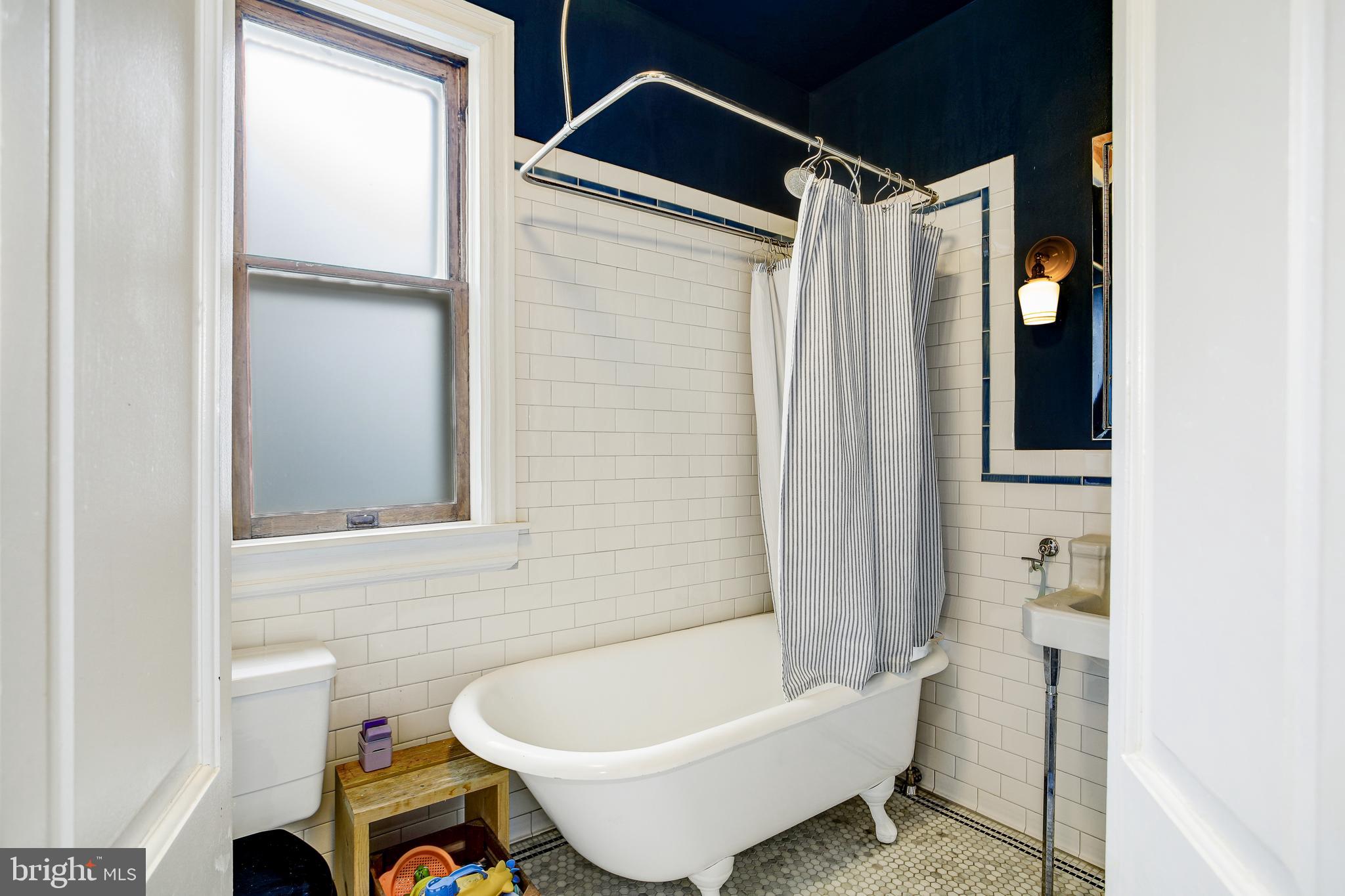 1511 D Street Southeast Washington, DC 20003 - Photo 22 of 29 Bath with restored clawfoot tub