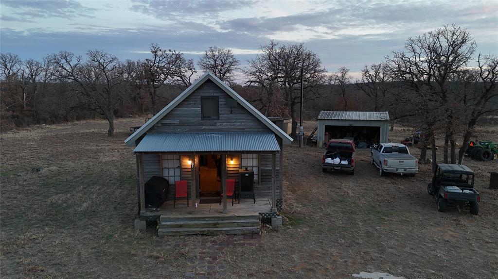 1921 Salt Creek Road Jacksboro, TX 76458 - Photo 2 of 37 a view of a car park in front of house