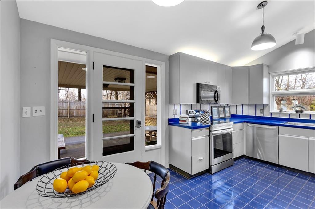 346 Churchill Road Pittsburgh, PA 15235 - Photo 12 of 40 a kitchen with stainless steel appliances granite countertop a stove and a sink