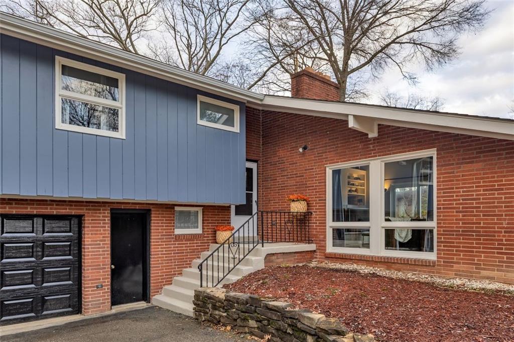 346 Churchill Road Pittsburgh, PA 15235 - Photo 2 of 40 a front view of a house with a tree