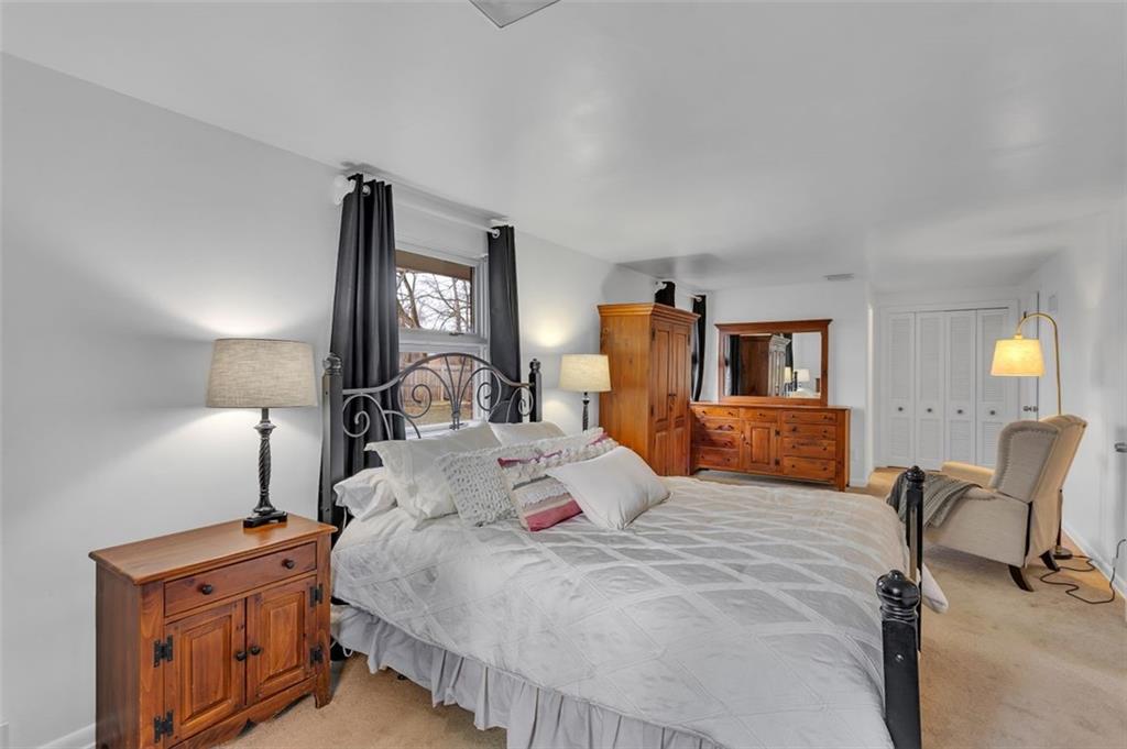 346 Churchill Road Pittsburgh, PA 15235 - Photo 22 of 40 a bed room with a bed and a chair