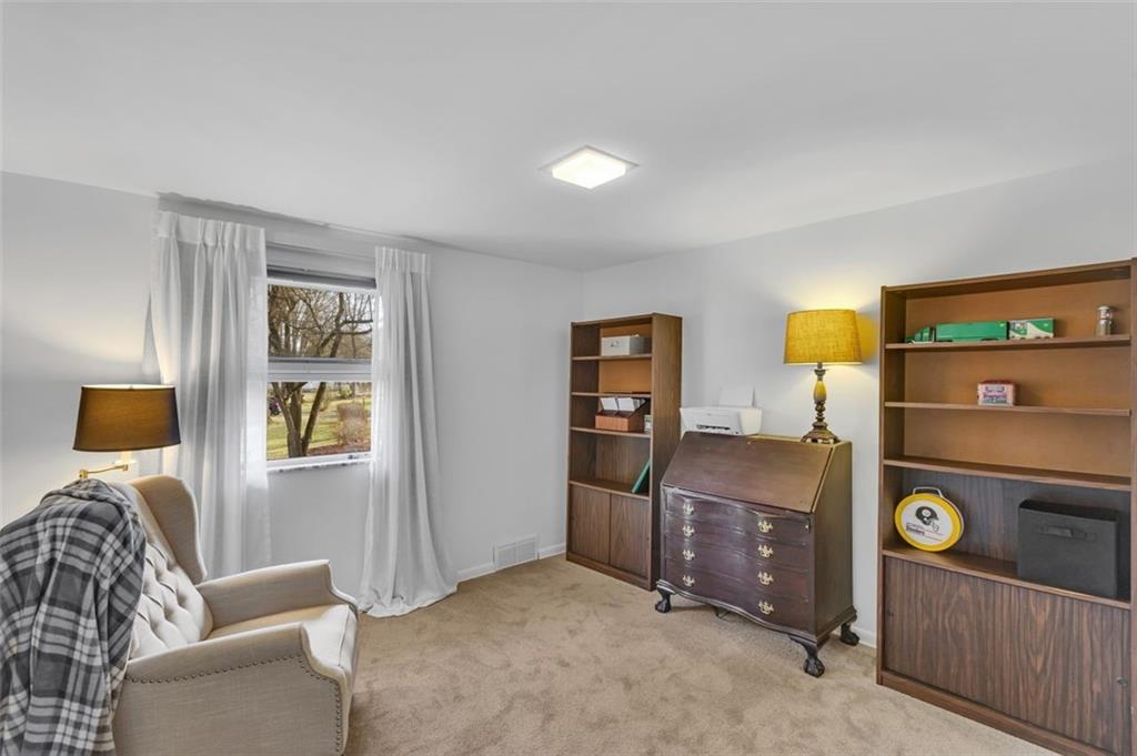 346 Churchill Road Pittsburgh, PA 15235 - Photo 27 of 40 a living room with a couch and a window
