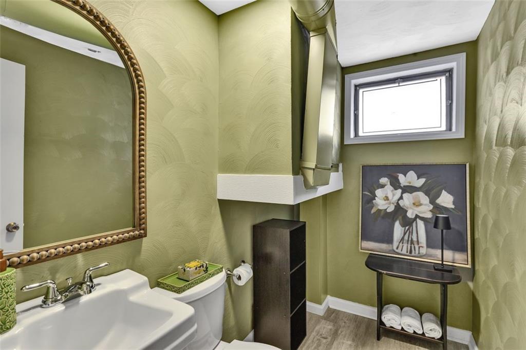 346 Churchill Road Pittsburgh, PA 15235 - Photo 34 of 40 a bathroom with a sink and mirror with toilet