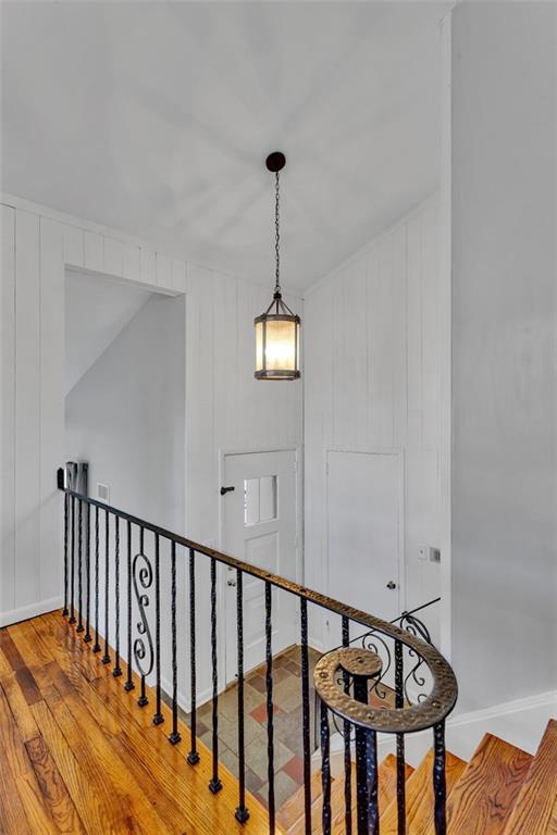 346 Churchill Road Pittsburgh, PA 15235 - Photo 5 of 40 a view of a hallway with wooden floor and stairs