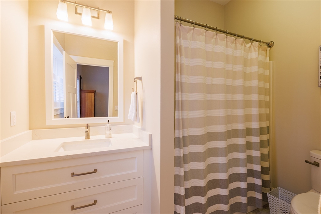 1776 Old Turnpike Road Oakham, MA 01068 - Photo 20 of 42 a bathroom with a sink and a mirror