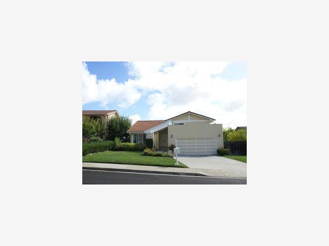 1807 Randall Road San Mateo, CA 94402 - Photo 1 of 9 a picture of a person on a street