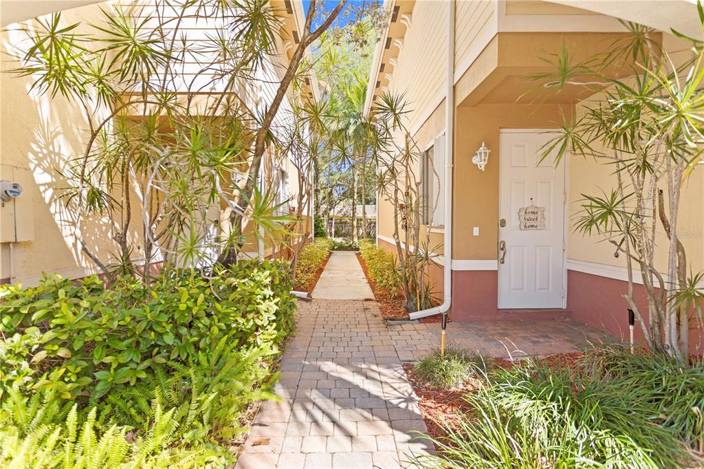4650 Southwest 75th Way Davie, FL 33314 - Photo 3 of 57 a view of a pathway of a house with a yard