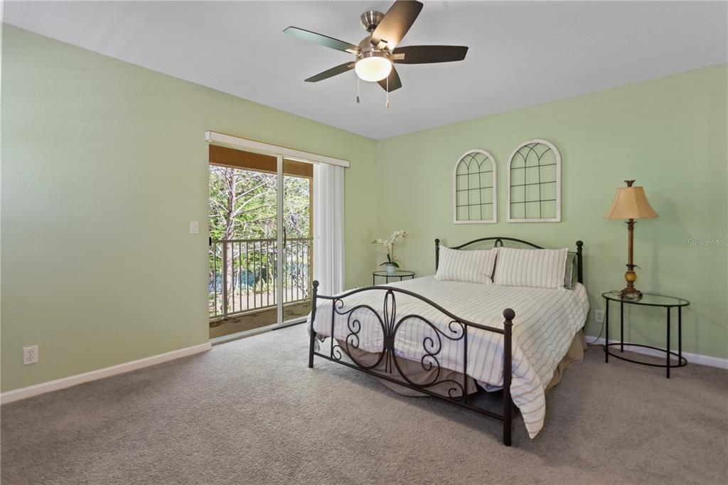 4650 Southwest 75th Way Davie, FL 33314 - Photo 31 of 57 a spacious bedroom with a bed and a window