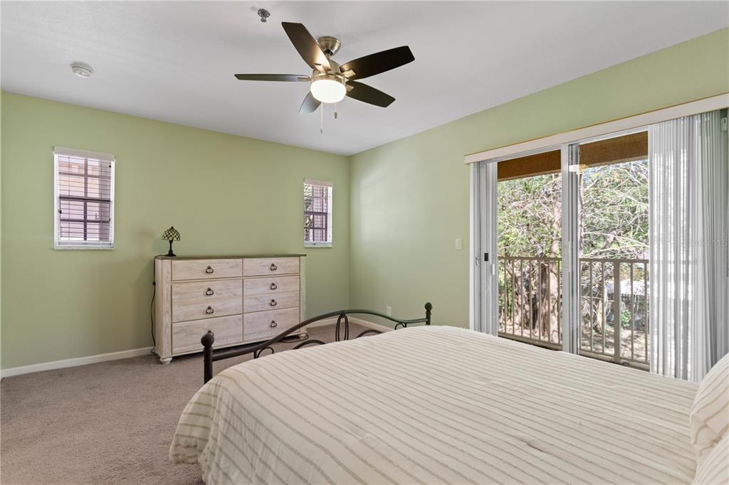 4650 Southwest 75th Way Davie, FL 33314 - Photo 33 of 57 a bedroom with a bed and a large window