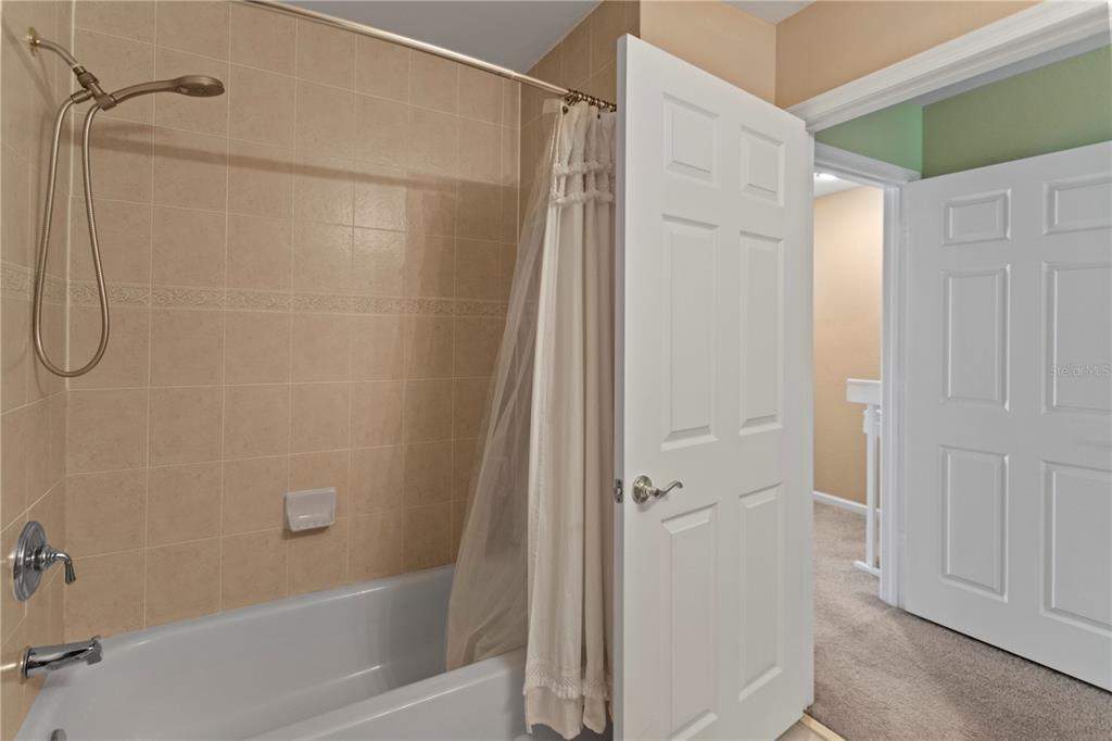 4650 Southwest 75th Way Davie, FL 33314 - Photo 37 of 57 a bathroom with a shower and a glass door