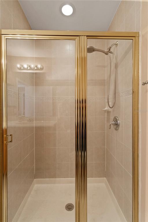 4650 Southwest 75th Way Davie, FL 33314 - Photo 48 of 57 a bathroom with a glass shower door