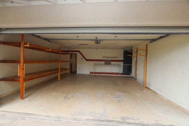 a view of storage and utility room