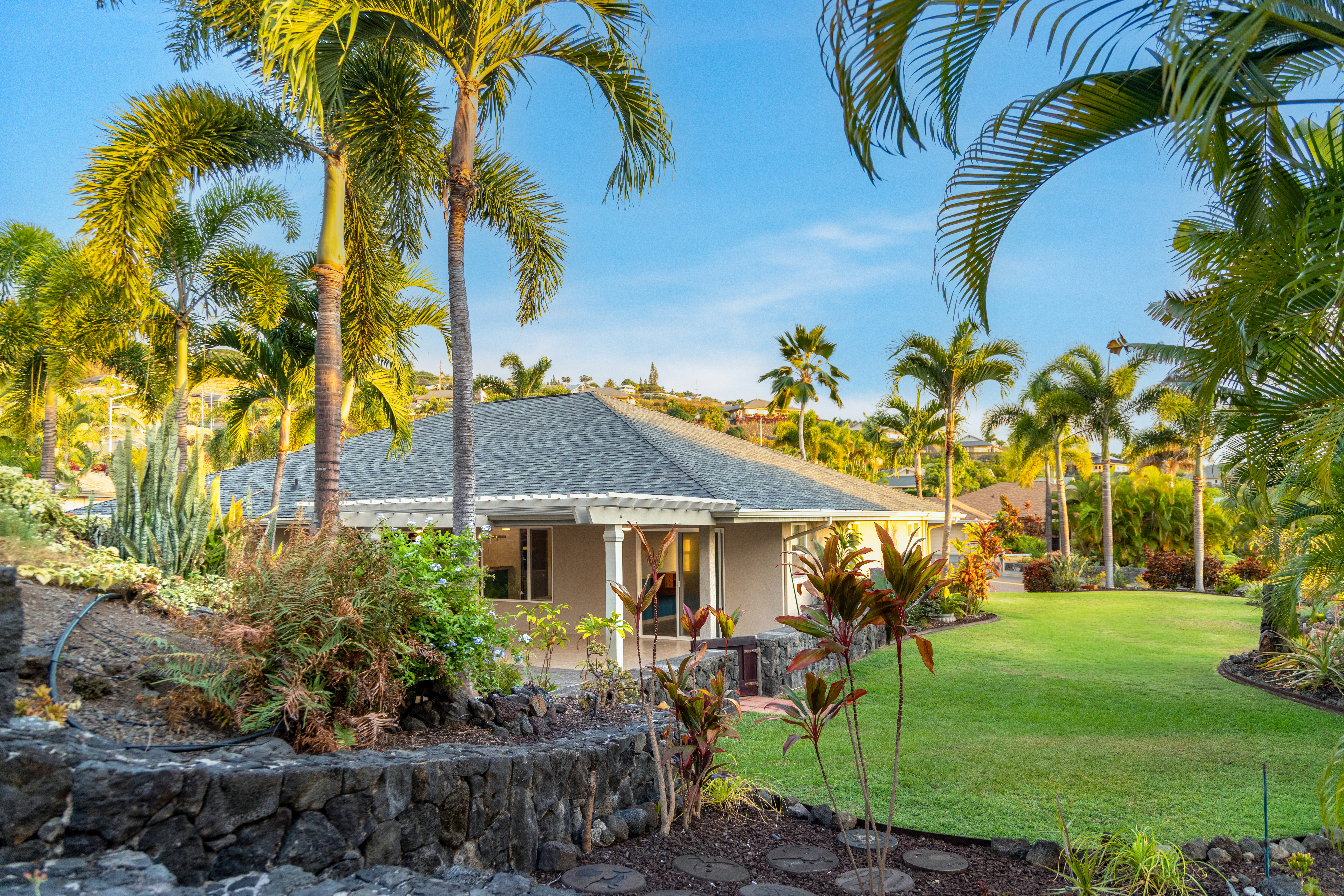 77-267 Hoomohala Road Kailua-Kona, HI 96740 - Photo 26 of 30 a front view of a house with a garden