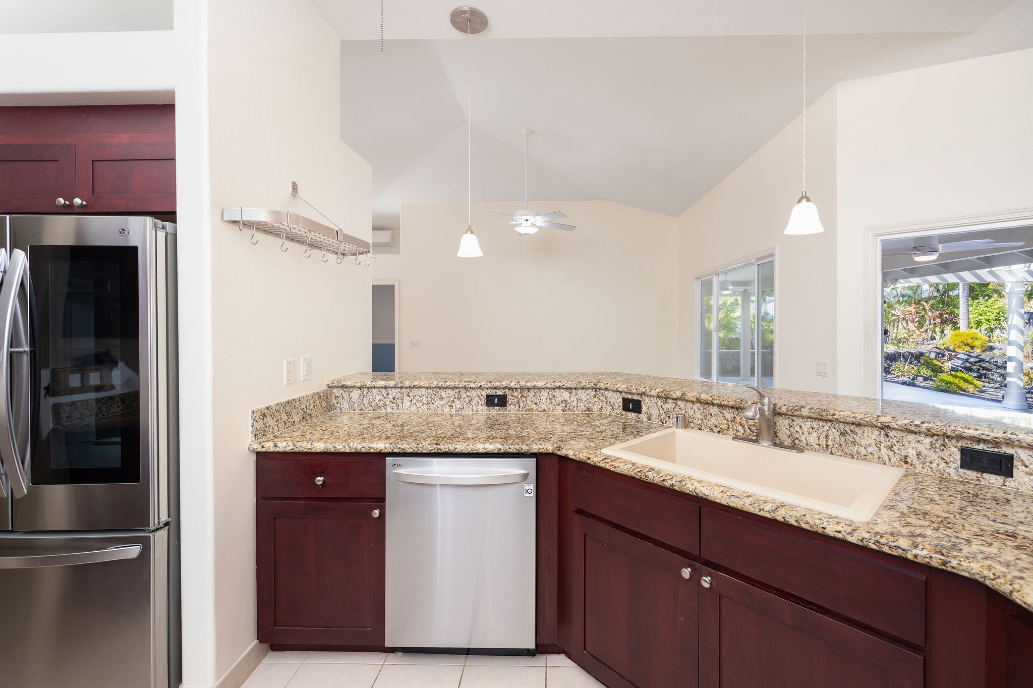 77-267 Hoomohala Road Kailua-Kona, HI 96740 - Photo 8 of 30 a bathroom with a granite countertop sink and a mirror