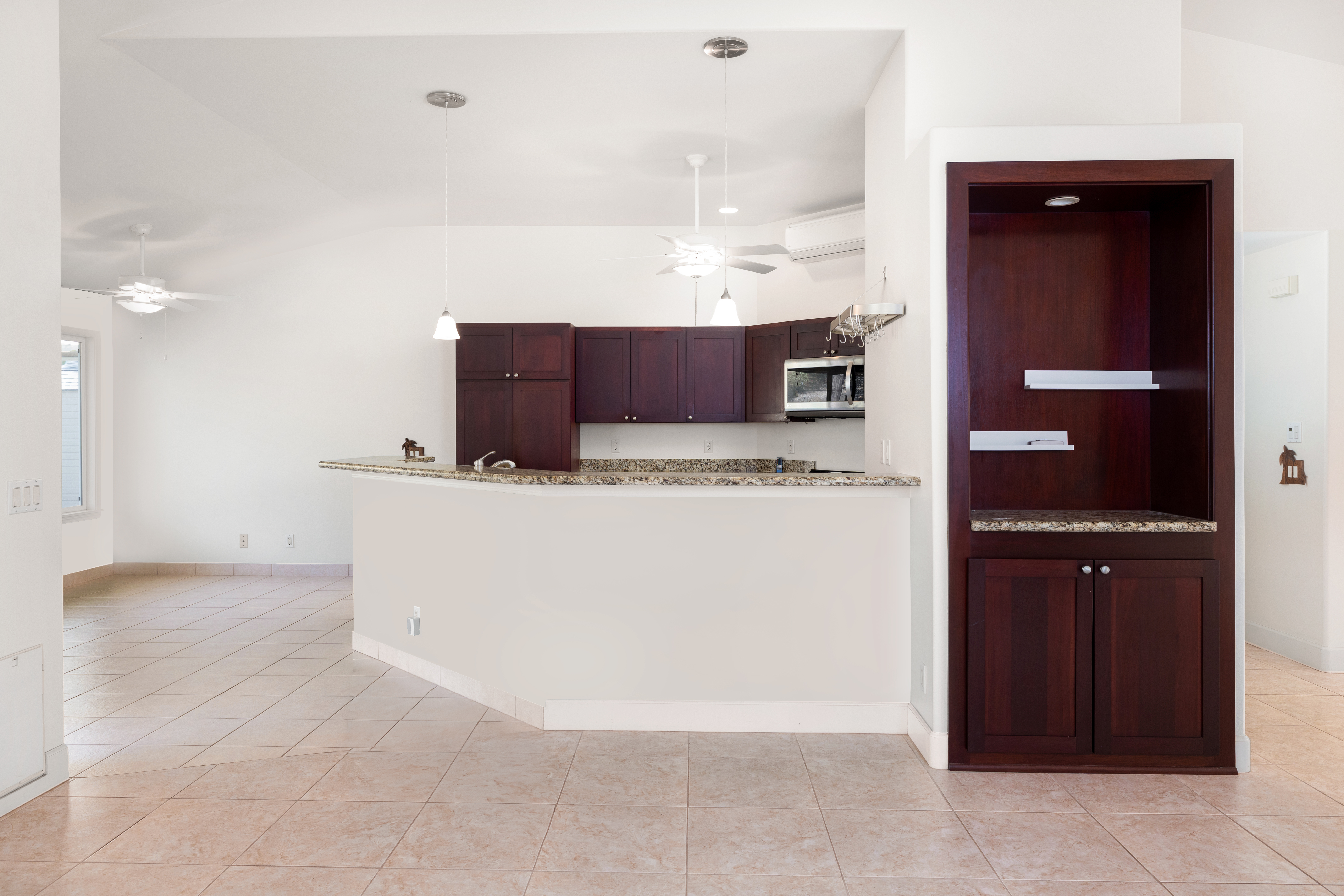 77-267 Hoomohala Road Kailua-Kona, HI 96740 - Photo 9 of 30 a bathroom with a sink a vanity and a mirror