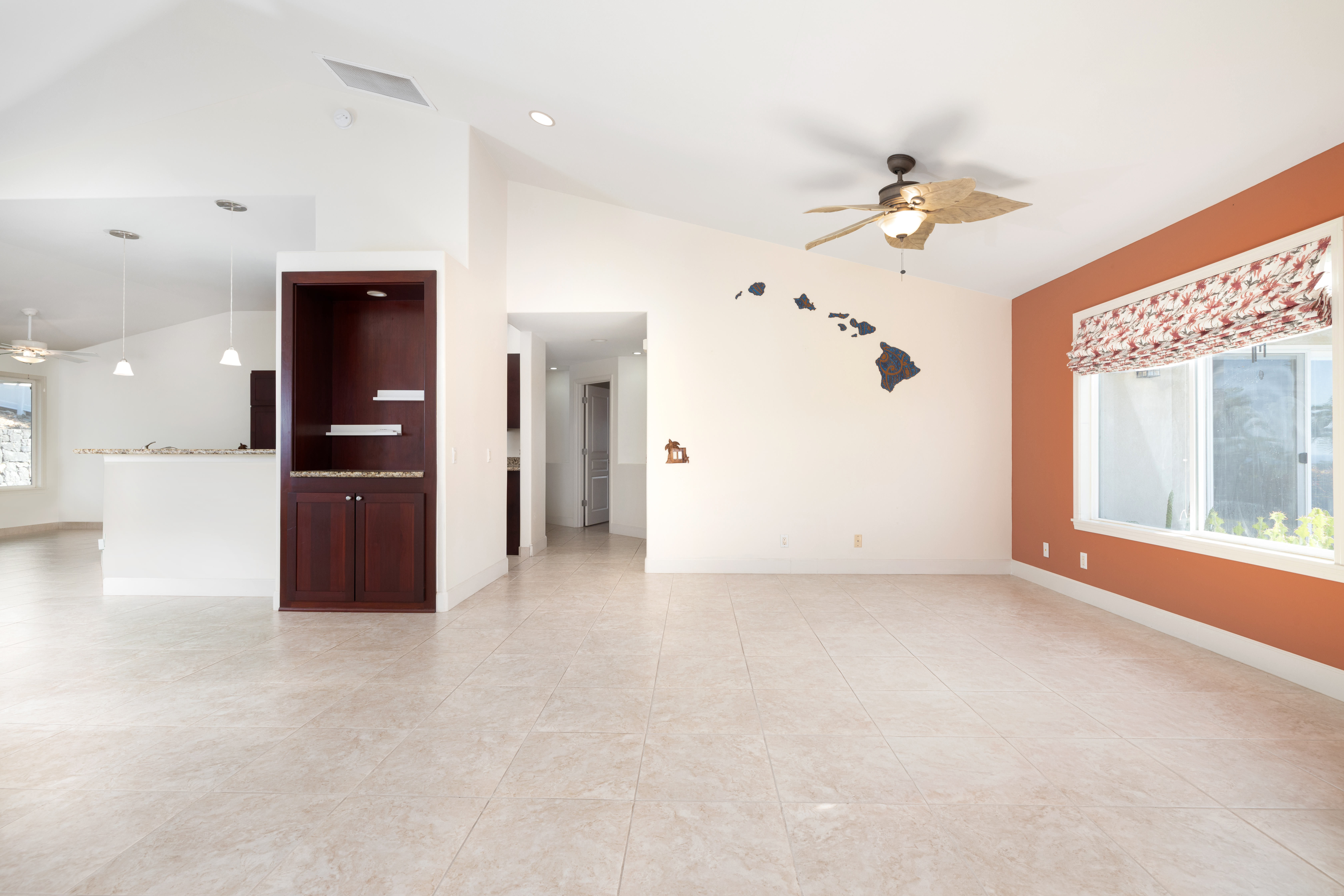 77-267 Hoomohala Road Kailua-Kona, HI 96740 - Photo 10 of 30 a view of a big room with windows and chandelier fan