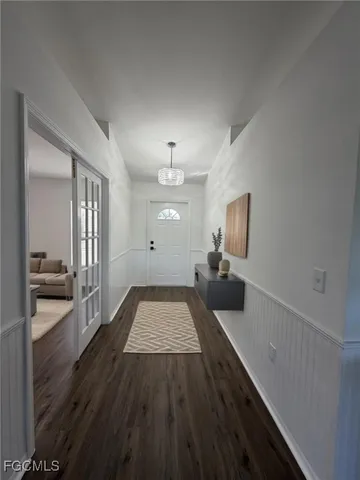 a view of a living room and dining room