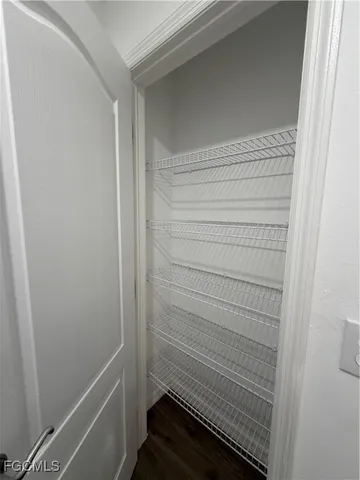 a view of a storage & utility room with washer and dryer