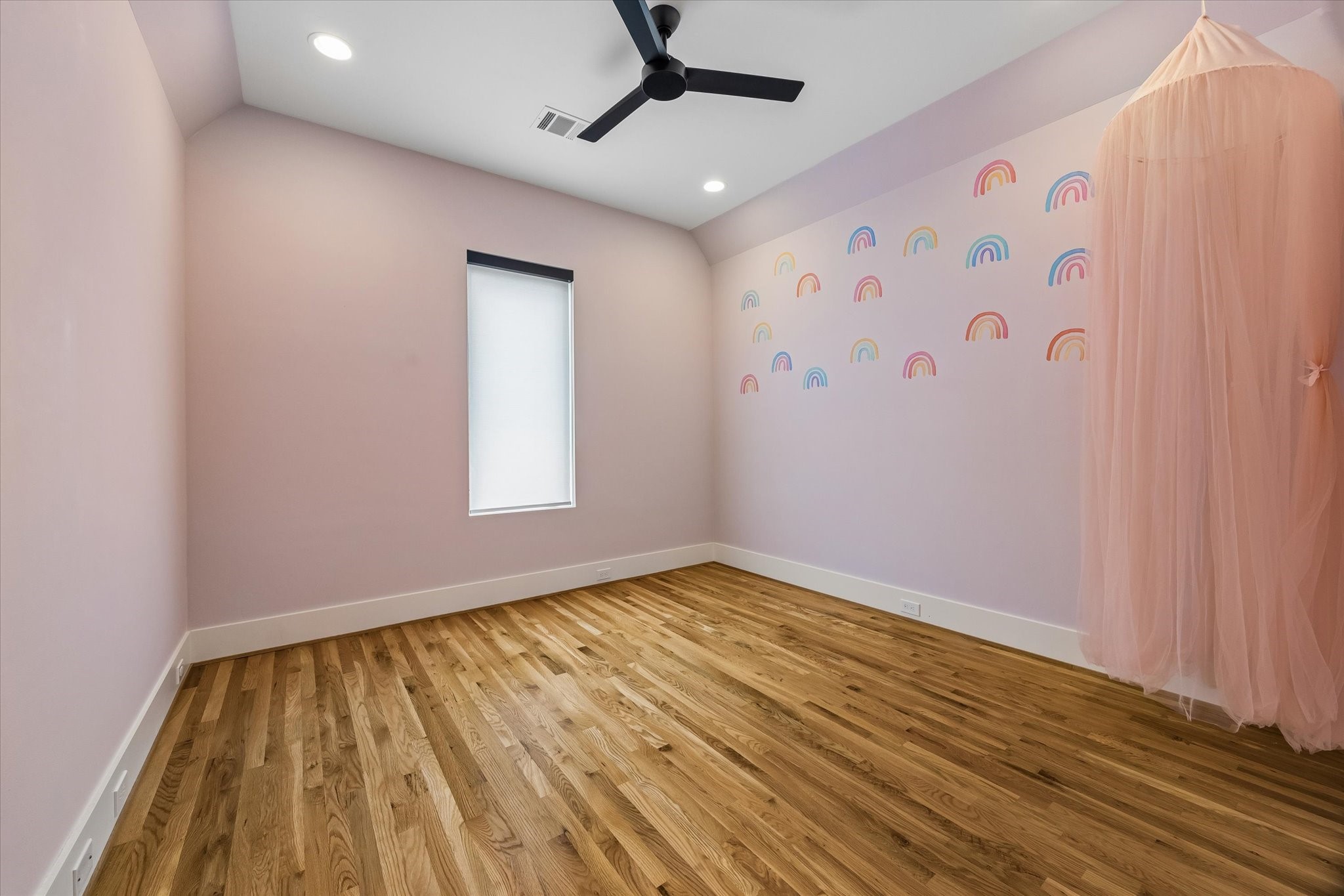 2705 Julian Street Houston, TX 77009 - Photo 37 of 50 Secondary bedroom. Vinyl decals can be removed.