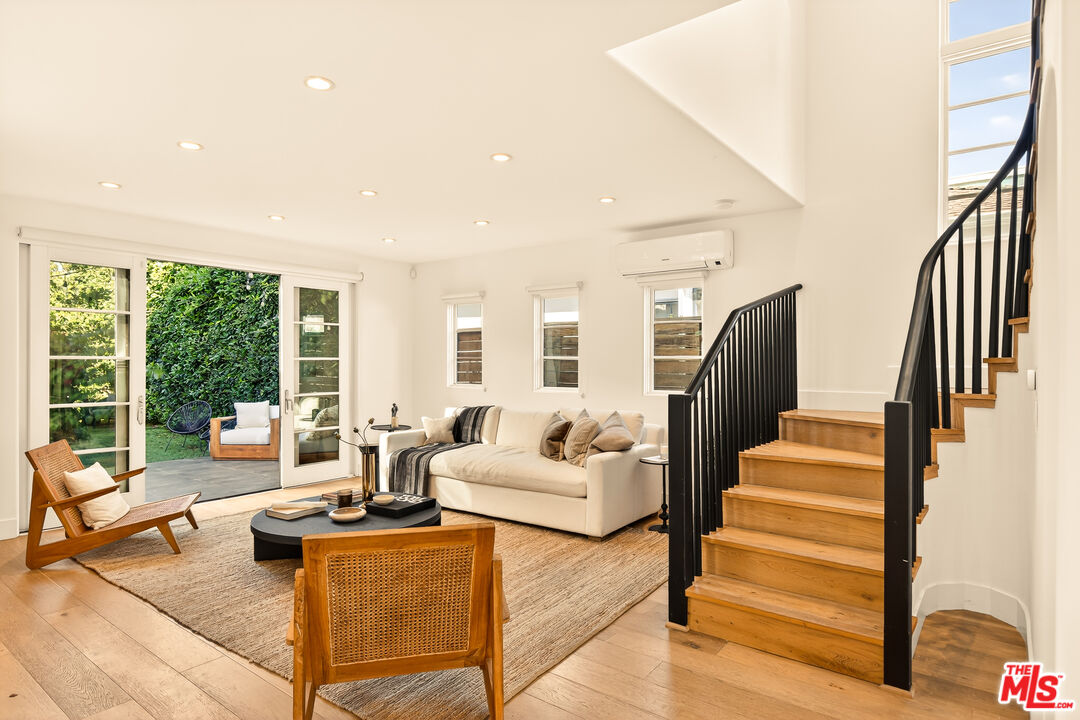 3128 Stanford Avenue Venice, CA 90292 - Photo 25 of 43 a living room with furniture and a stairs
