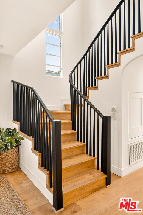 3128 Stanford Avenue Venice, CA 90292 - Photo 26 of 43 a view of staircase with lots of frames on wall and stairs